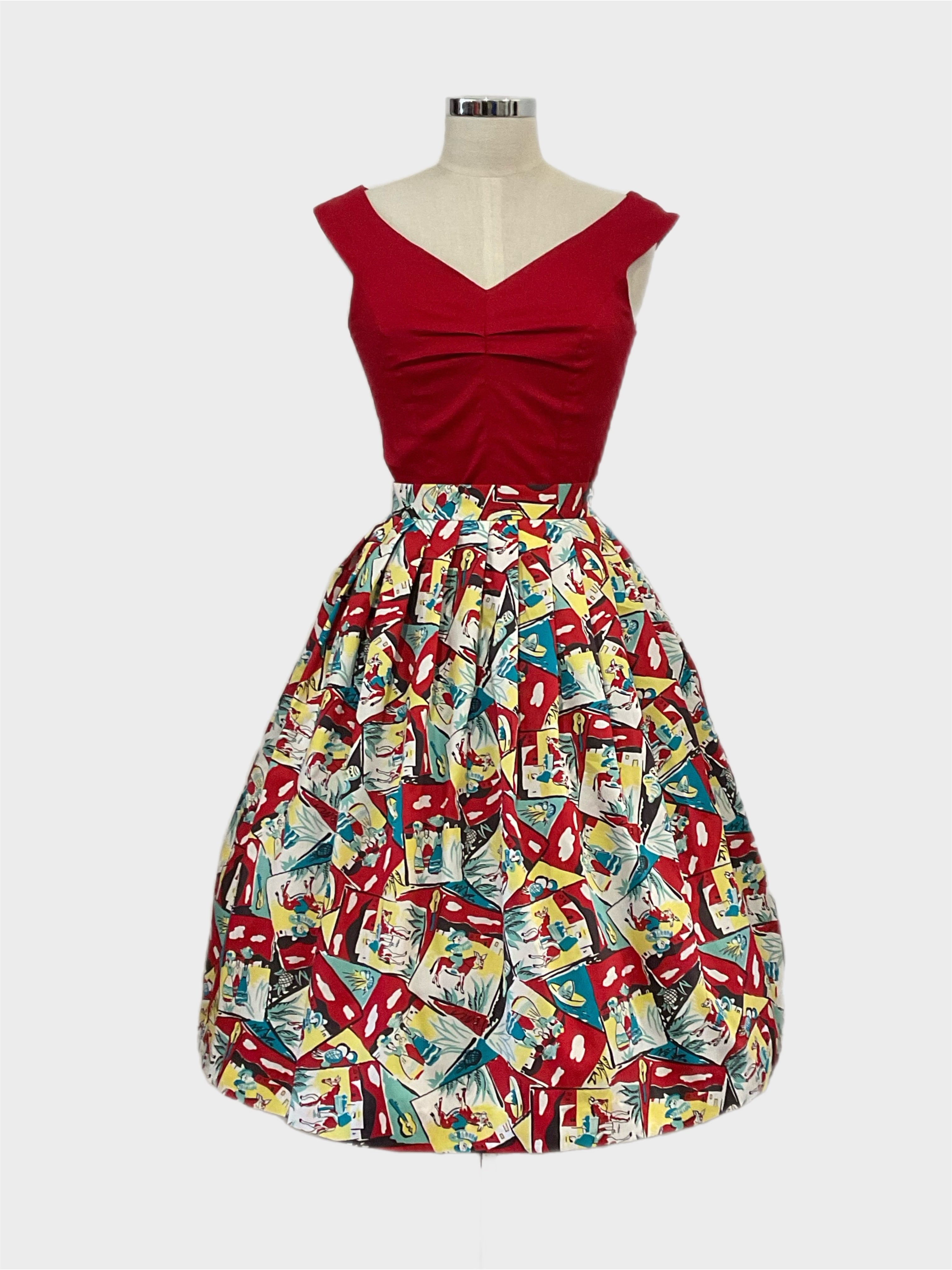 A vintage 1950s style skirt with a mexican  style novelty print, south of the border  featuring   musical instruments . Colourful skirt..