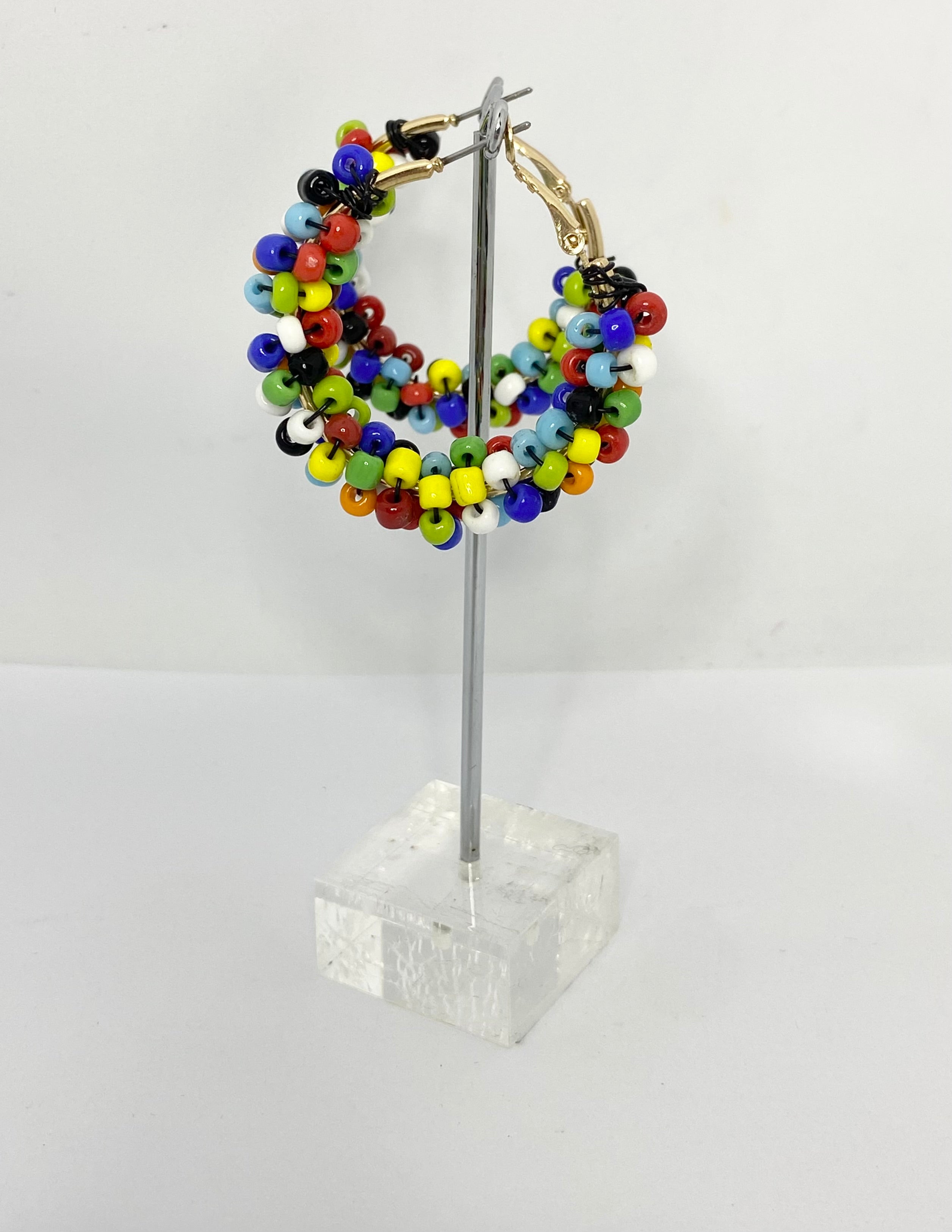 Fiesta multi coloured hoop earrings with small coloured beaded on gold hoops.rainbow coloured fun vintage style earrings