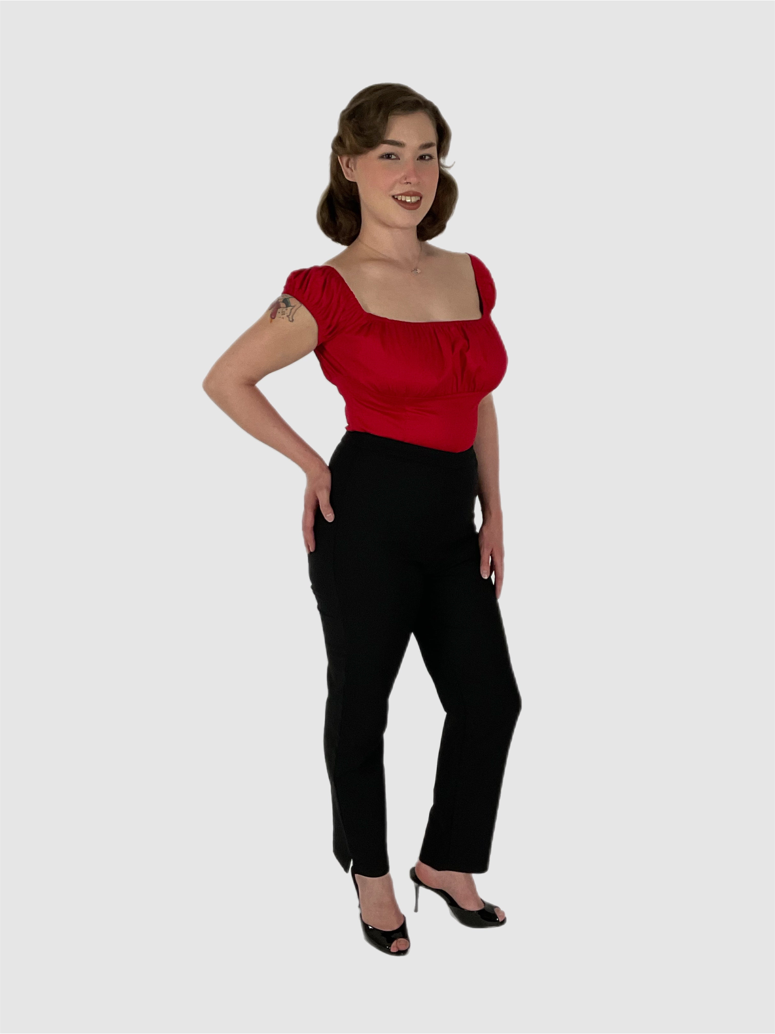 top red with black 1950s style cigarette pants in black.