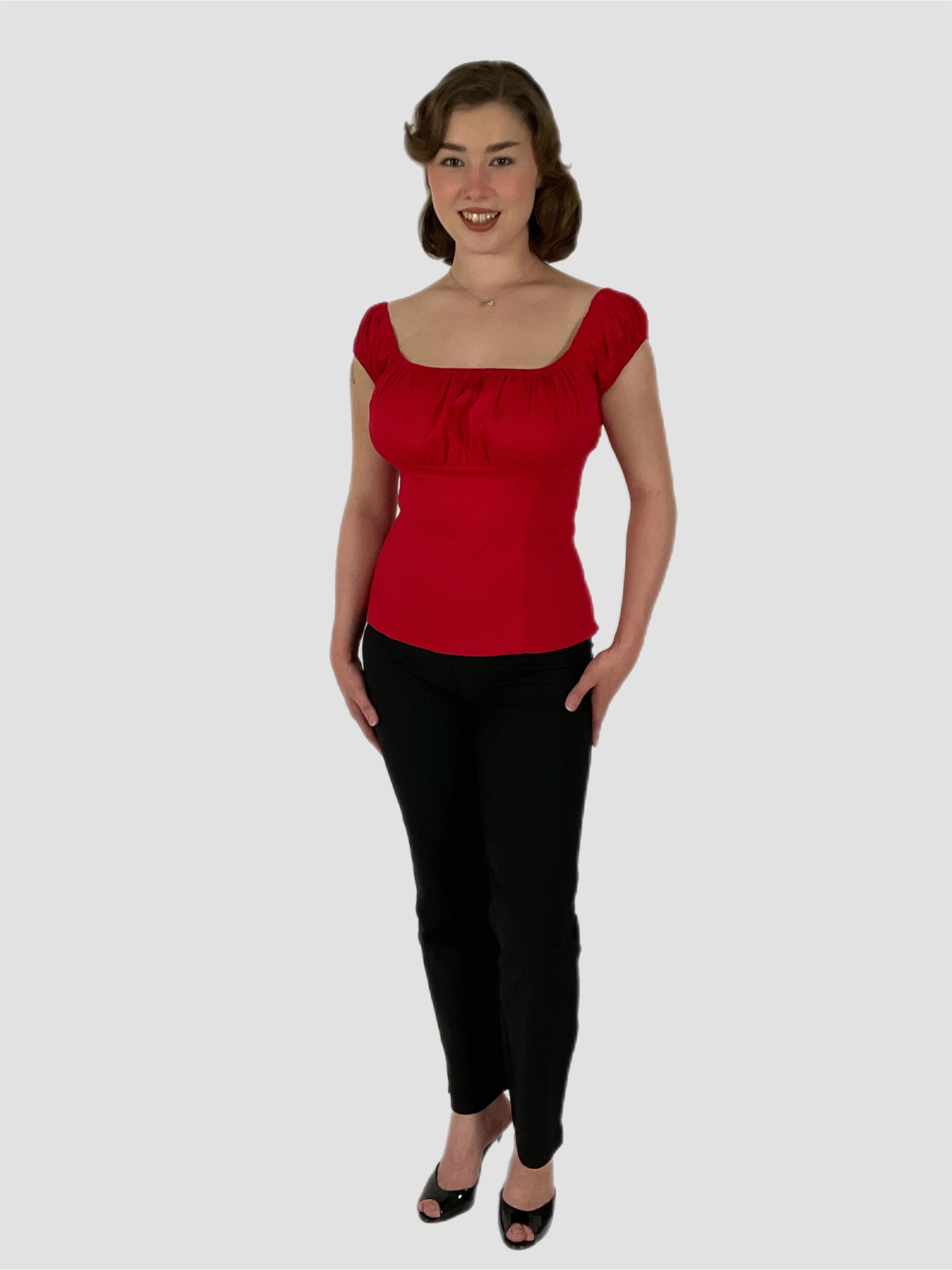 top red with black 1950s style cigarette pants in black.
