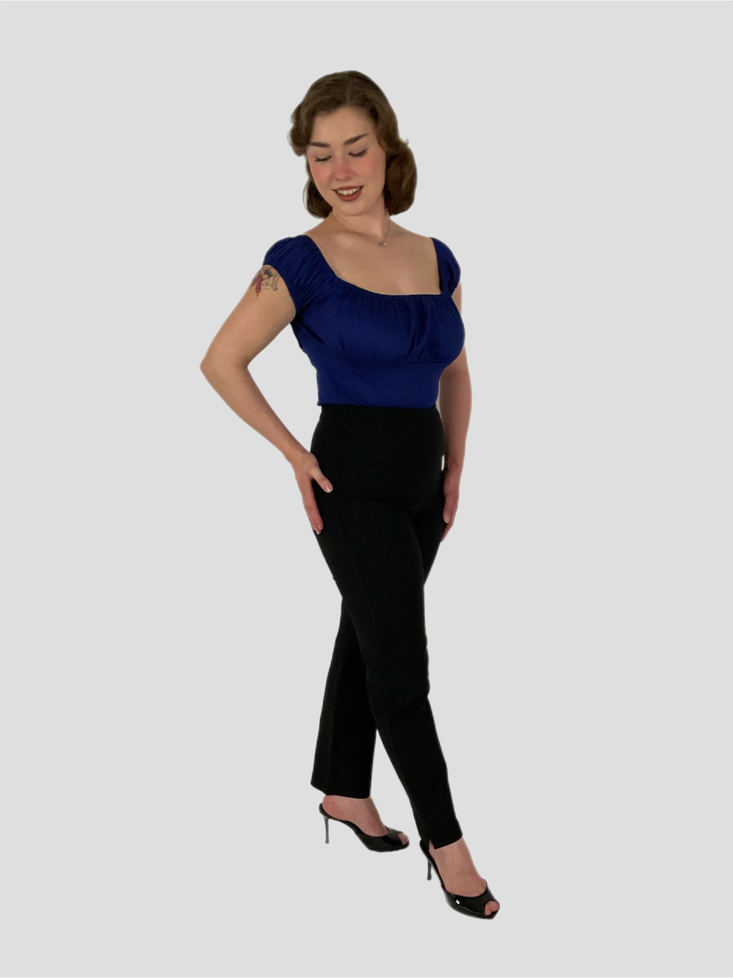 Peasant vintage style top in a dark blue with black cigarette pants. 1950s pin-up styling.