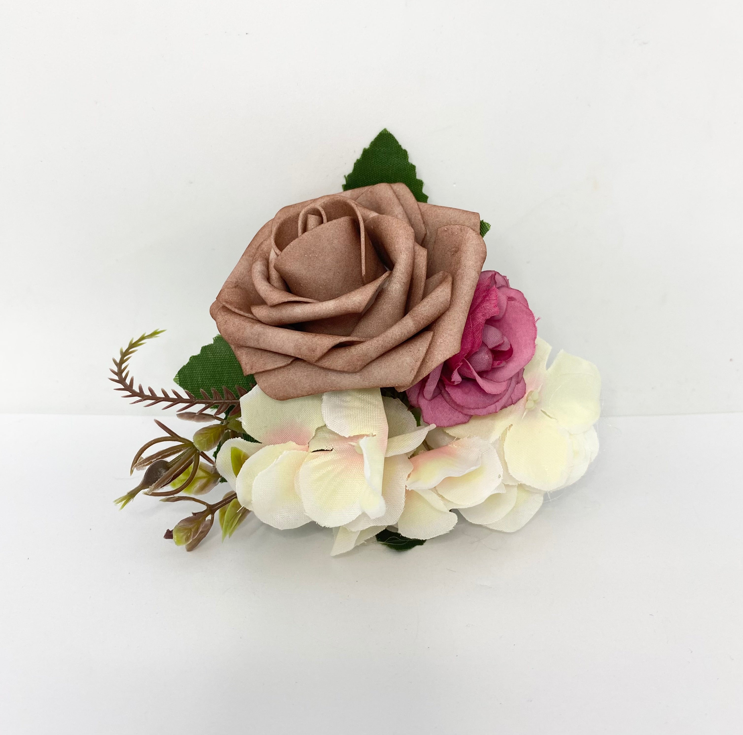 Romantic blush1940s/1950/ vintage style hair Flower clip with brown, pink, and white flowers on a white background