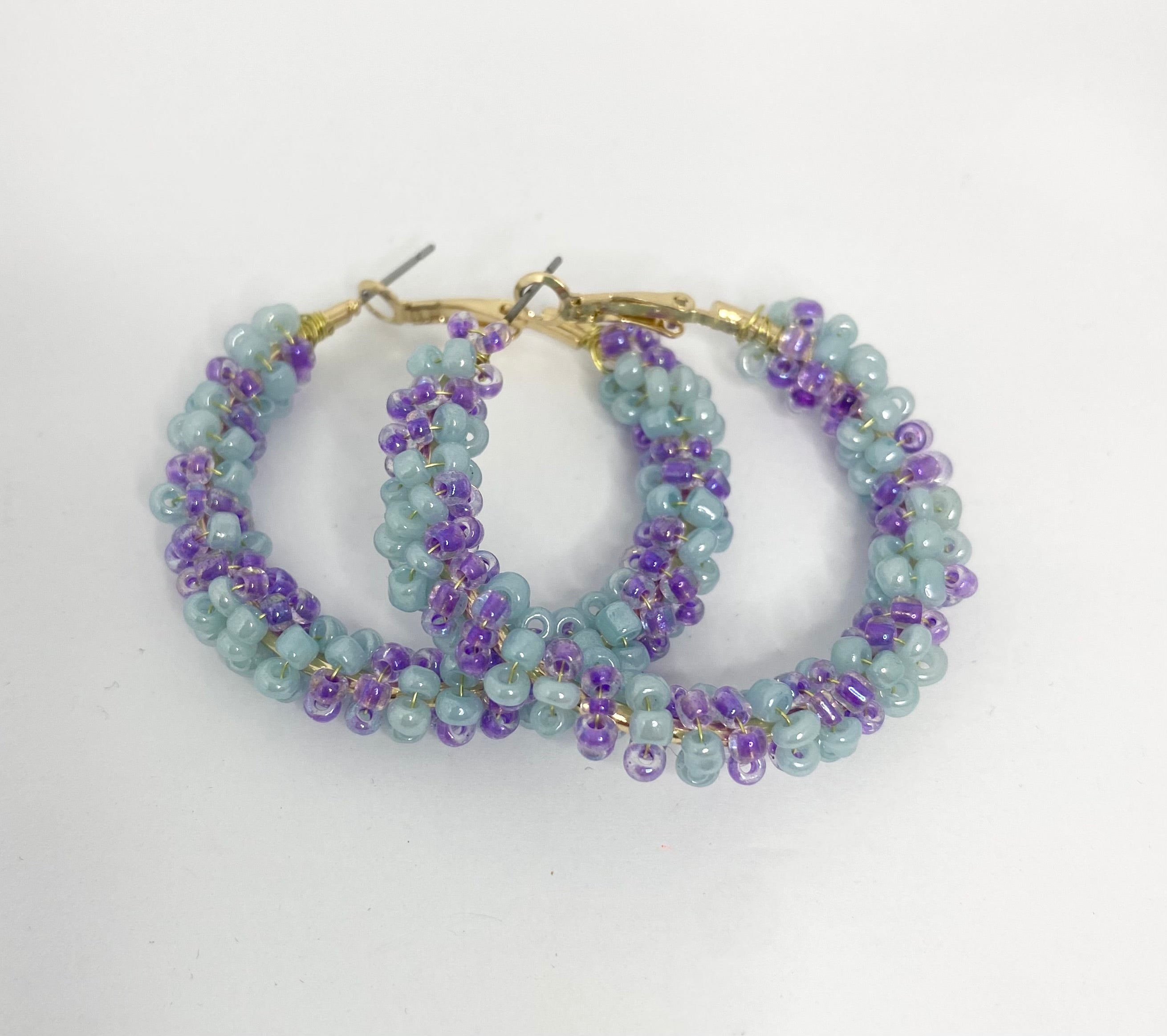 Sherbet blue/mauve beaded 1950s inspired hoop earrings.