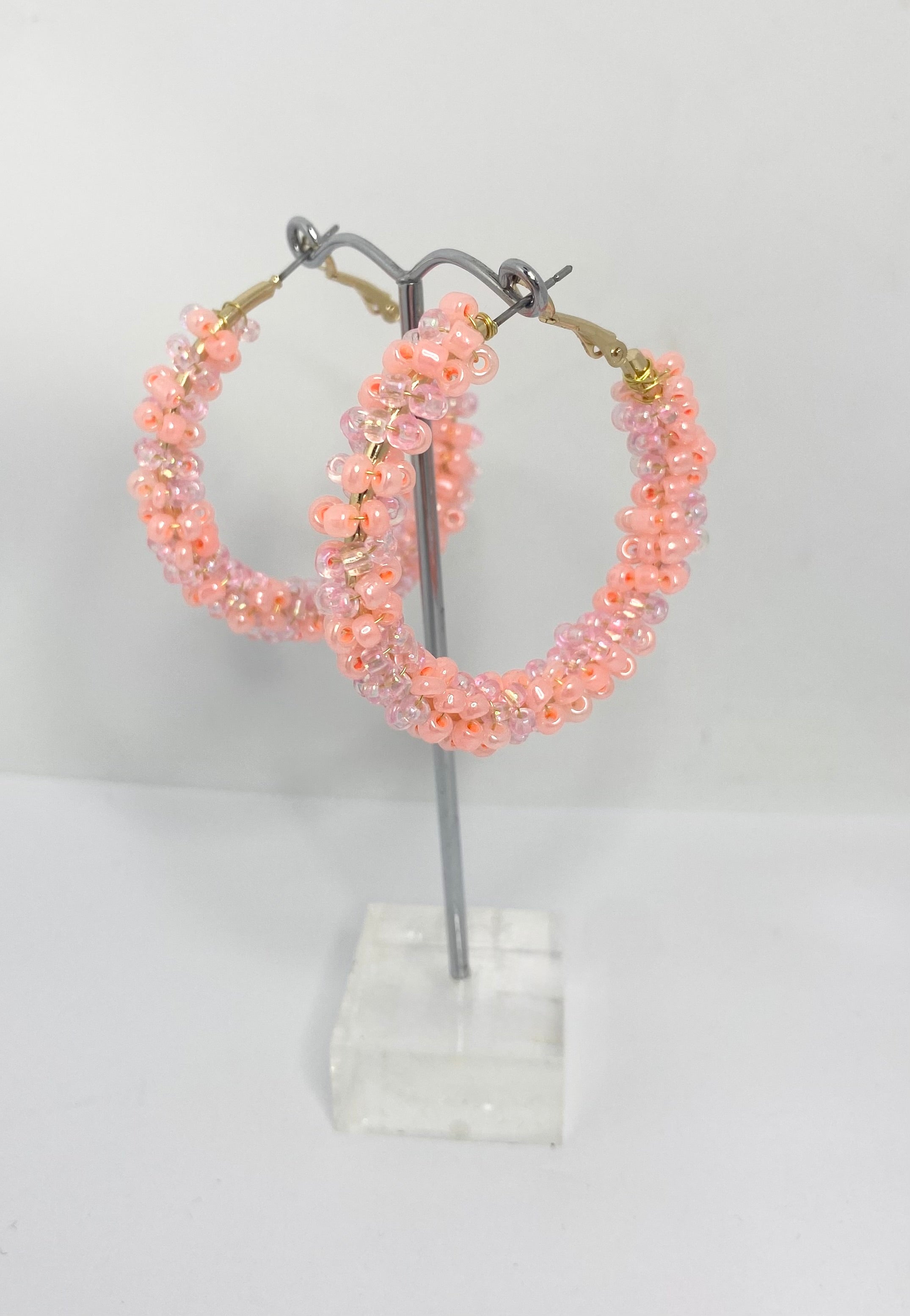Sherbet peach and soft pink 1950s inspired beaded hoops.