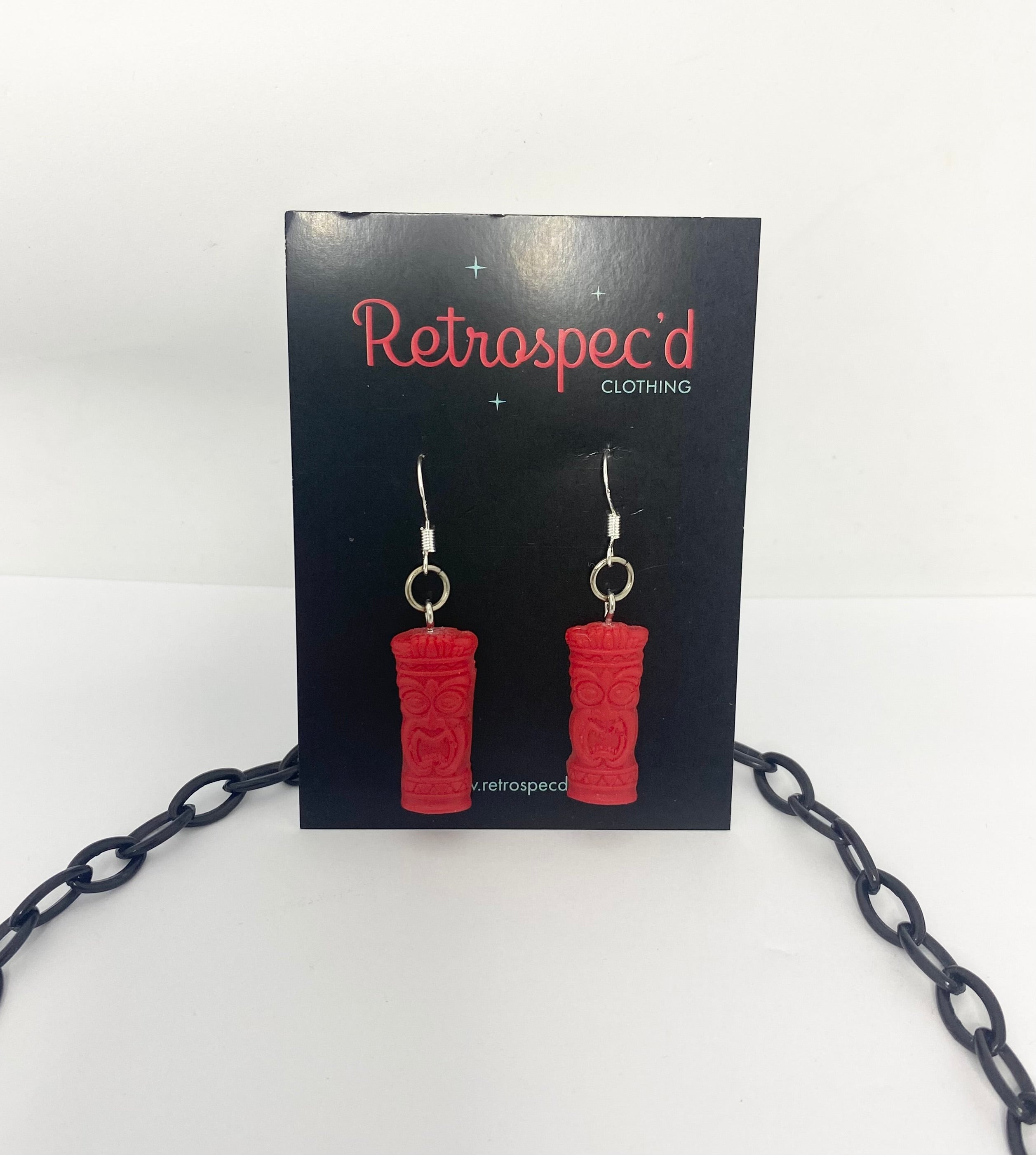 Tiki 1950s style Necklace set with Red earrings on a 'Retrospec'd Clothing' card with a white background