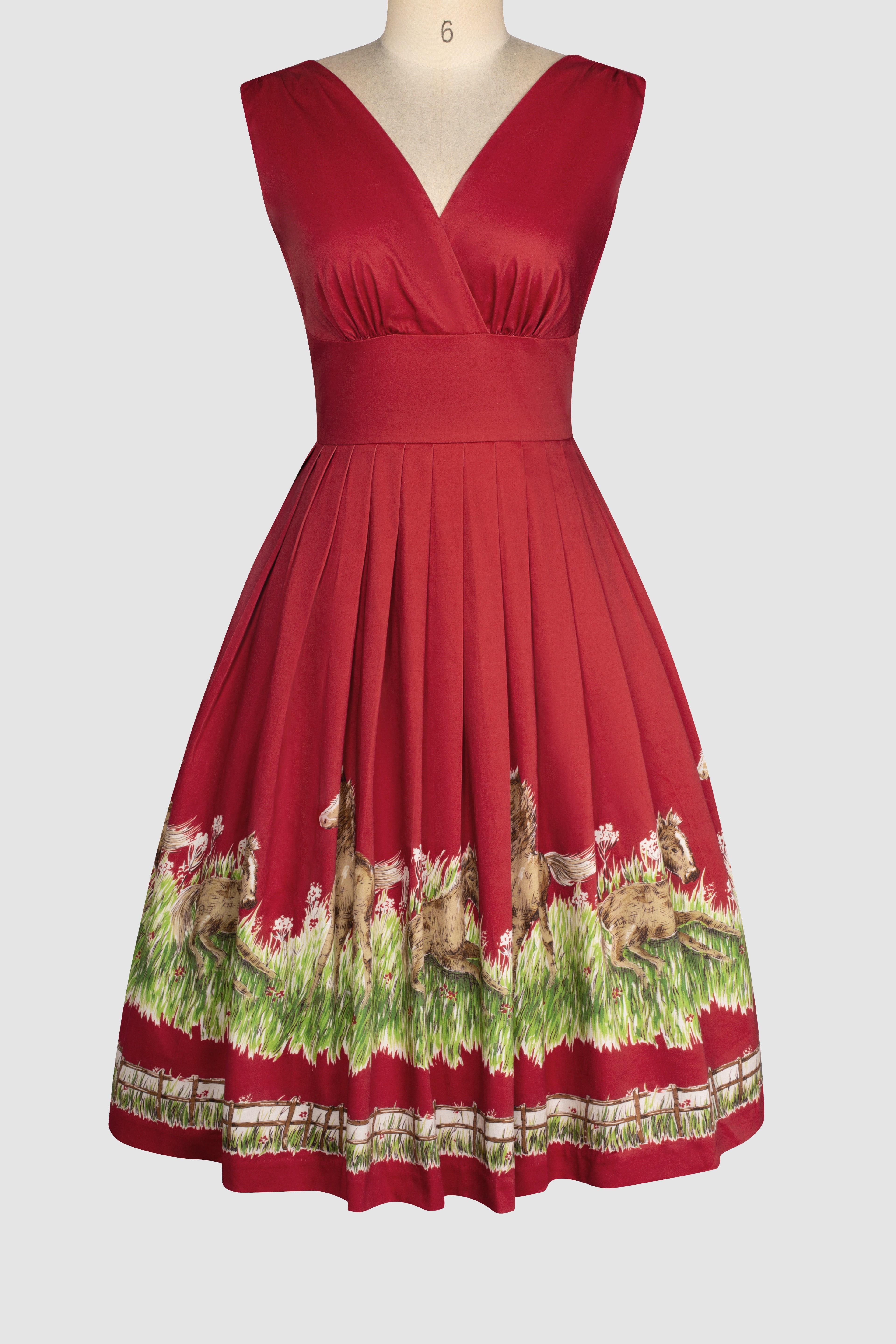  Vivian Greener pasture red vintage style Dress A red vintage style dress with a V-neck front, shoulder gathers, and a floral Horse novelty  pattern on the skirt.