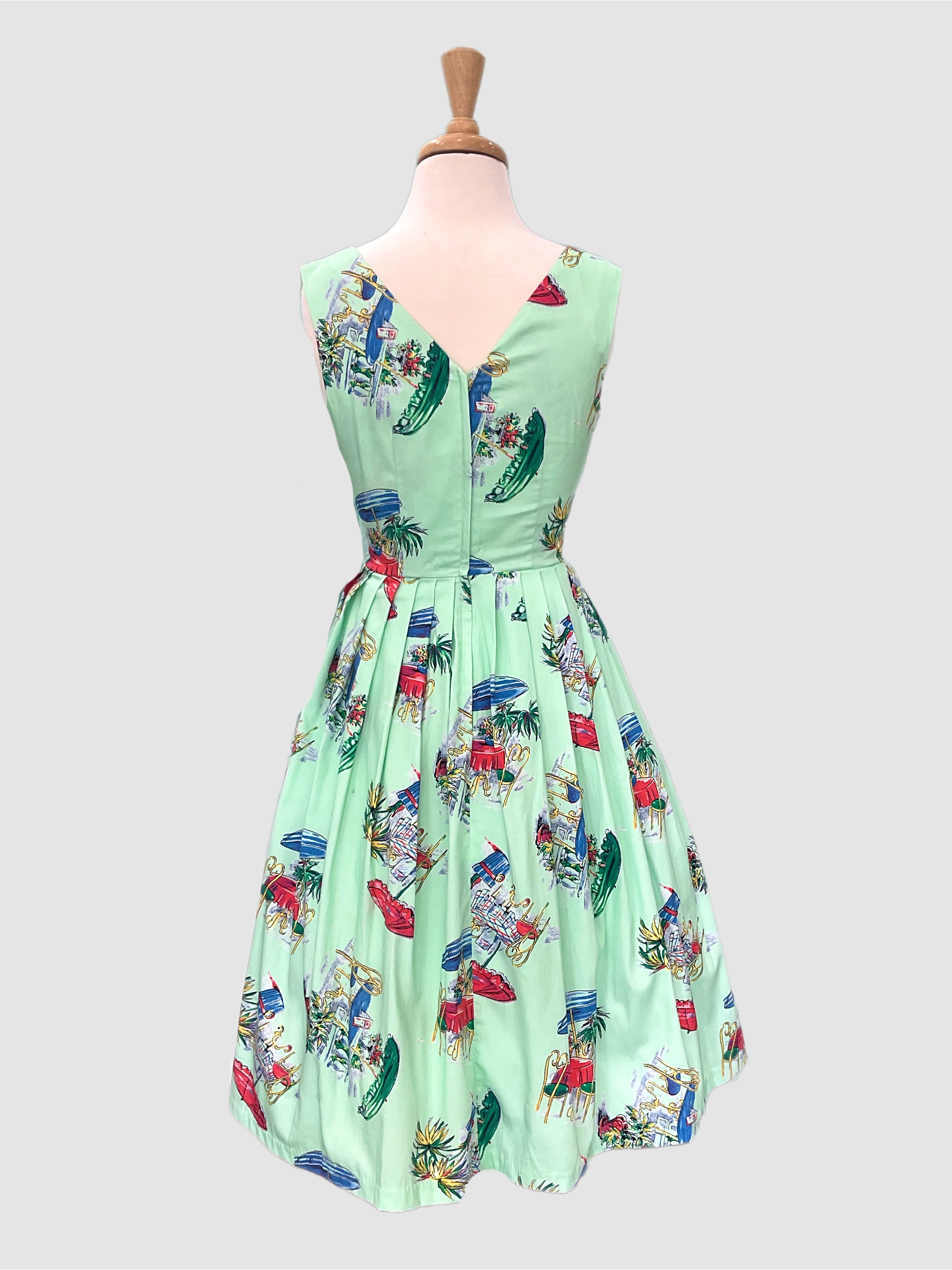 vivian le Parisian cafe 1950s vintage stye dress in mint green with a Parisian cafe novelty print